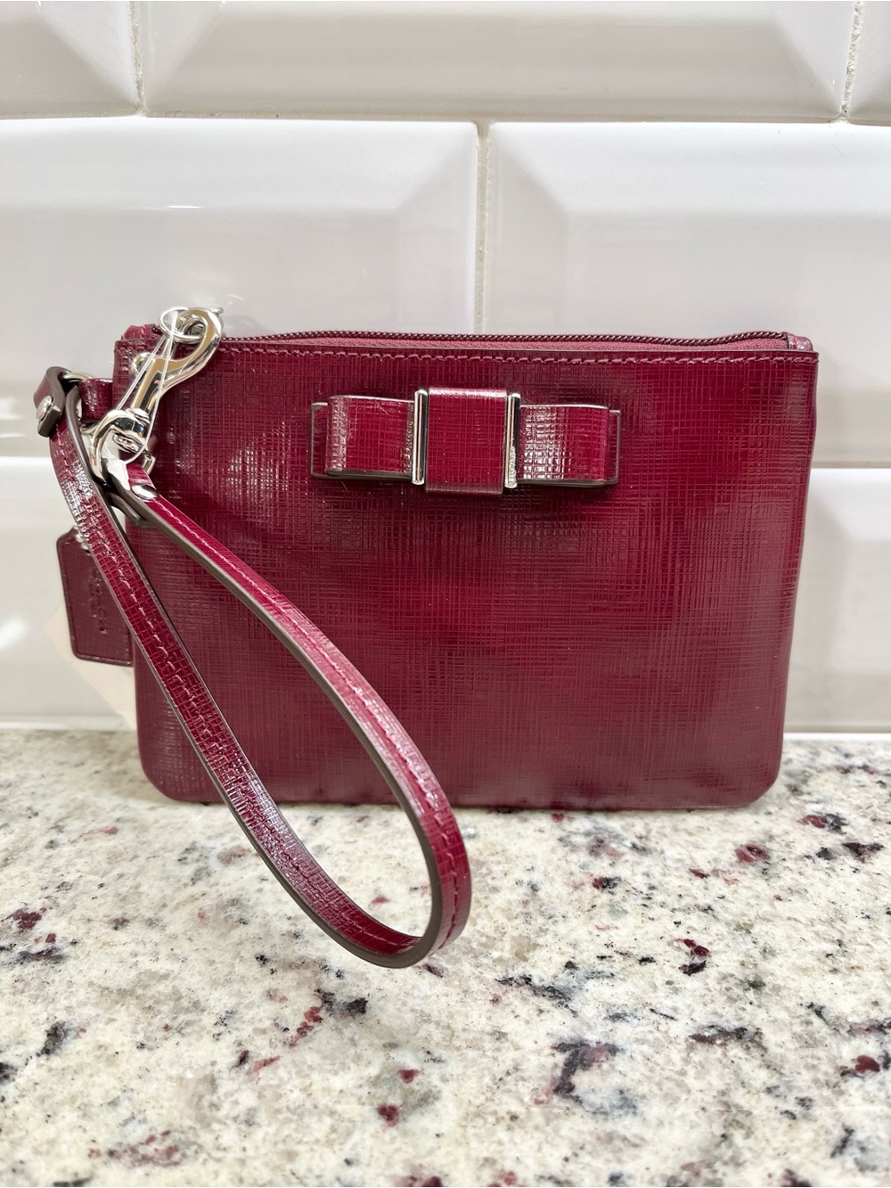 Coach Darcy Bow Wristlet in Sherry Saffiano Patent Leather NWT